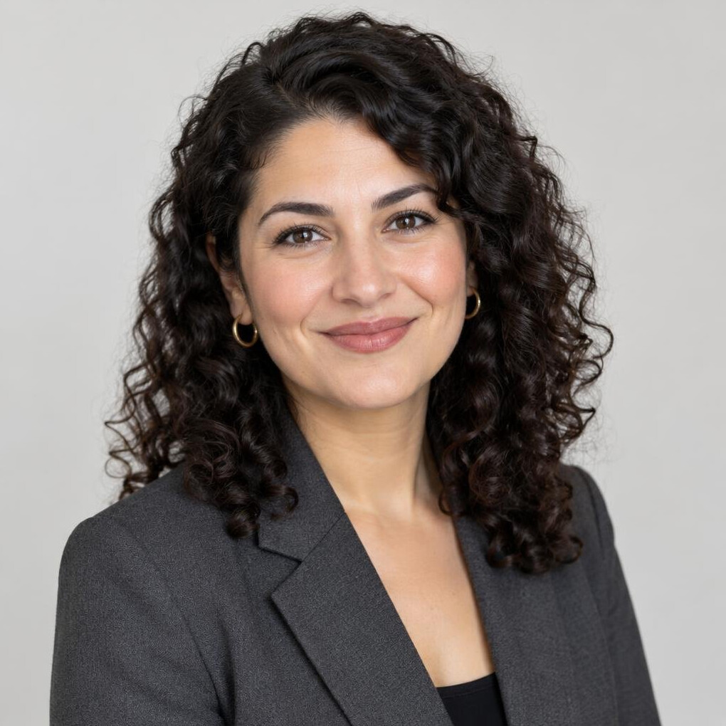 Portrait of a professional woman with curly hair